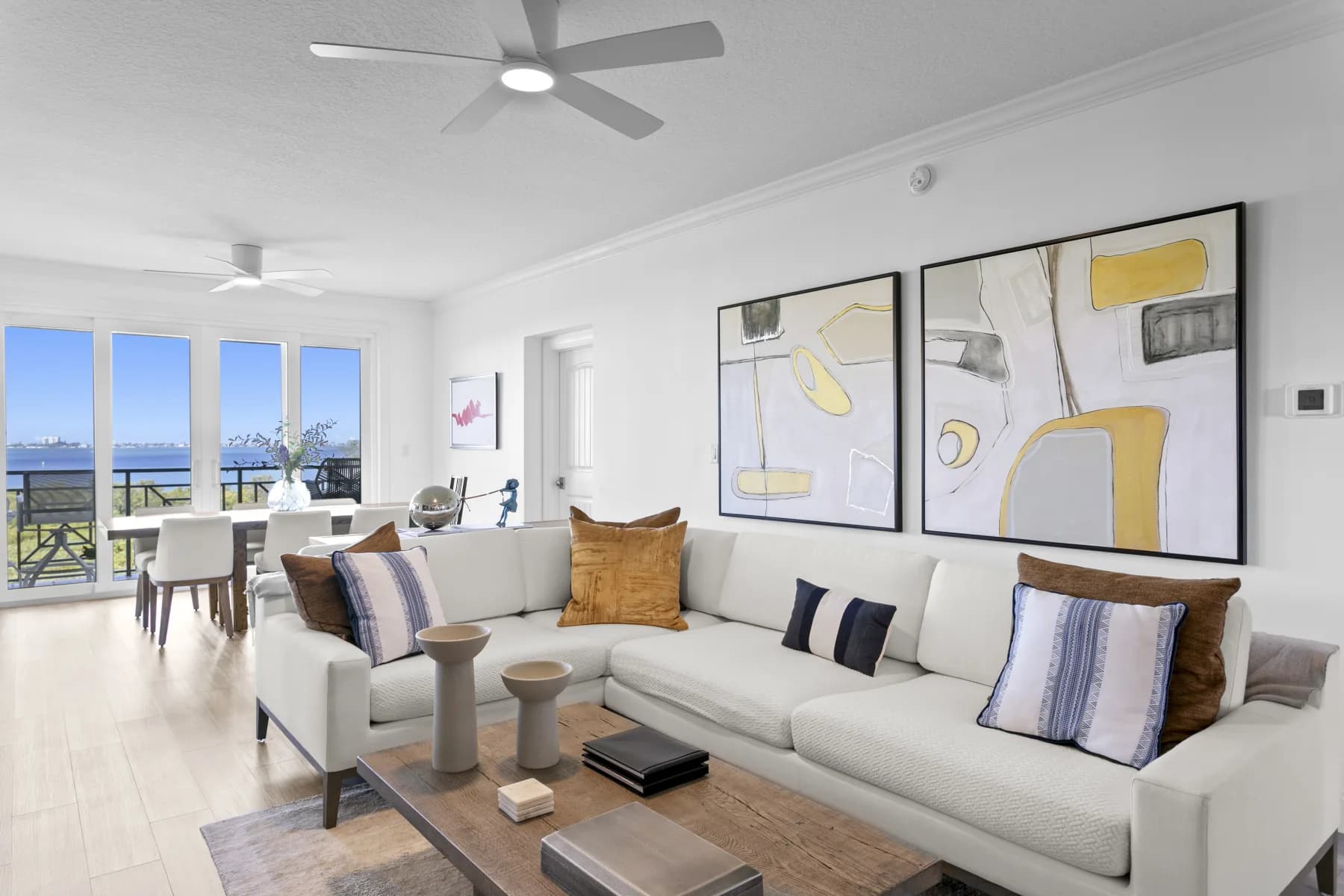 Living room at 4780 Dolphin Cay Ln S #404 with Boca Ciega Bay views